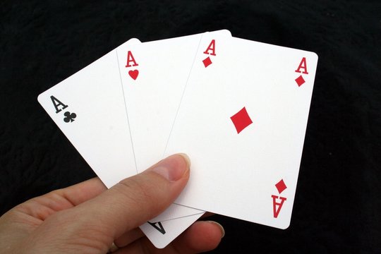 arm with three cards