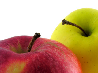 Yellow and red apples. Isolated on white background. A close up.