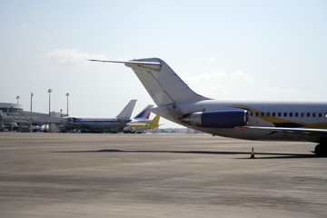 airplanes on a runway of international airport terminal.