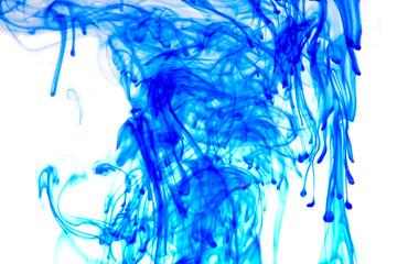 blue ink in water on white background