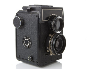old photo camera over white background