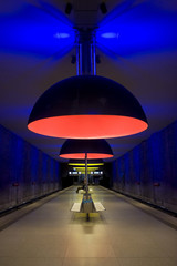 A boldly lit subway station