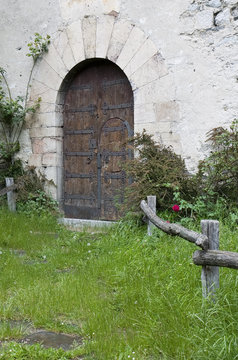 Ancient door in the church of Setcases, Catalonia, Spain