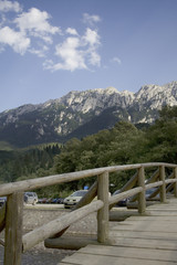 Fototapeta na wymiar Mountain landscape and wooden bridge