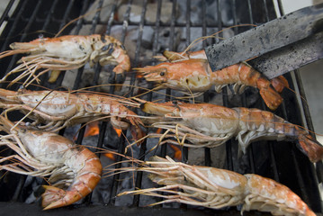 shrimp being grilled on a BBQ