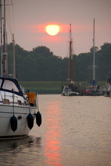 Red orange sun at sunset