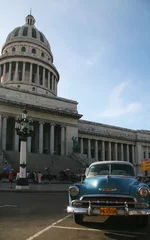 Wall murals Cuban vintage cars afternoon at capitolio  