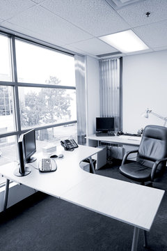 wide angle of office desk in blue tone