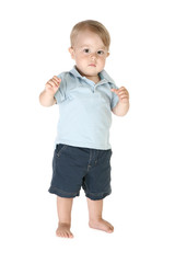 Adorable one year old boy toddler barefoot over white.