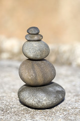 Fototapeta na wymiar Pile of round rocks in balance - zen concept