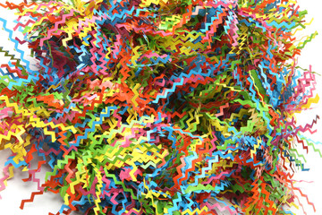 A very colorful confetti background over shite
