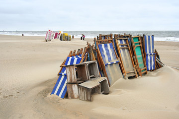 Off Season: Stacked beach chairs in a resort