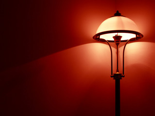 Bedroom lamp with red wall