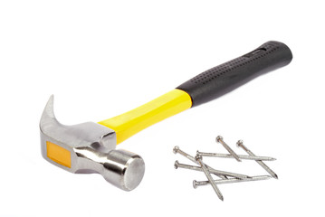 Hammer tool & group of nails isolated on white background