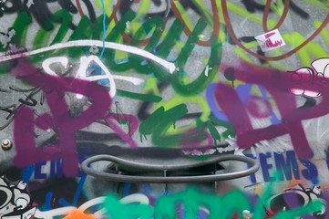 Graffiti on a basketball backboard.