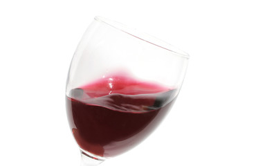 Glass of red wine on white background