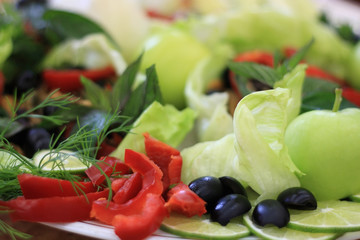 Obraz na płótnie Canvas Close-up of assorted fresh vegetables, fruit and herbs