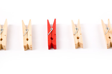 Clothespin with white background, concept of teamwork