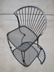Empty Iron Chair with Shadow