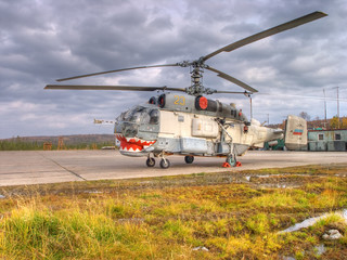Fototapeta na wymiar The Russian military helicopter. The Helicopter-shark..