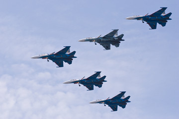 five fighters in the sky