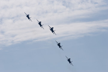 five fighters in the sky