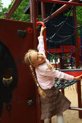 Five years girl on the playground  