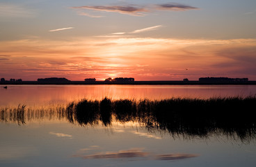 Fototapeta na wymiar Sunset lake landscape. Chany lake, Novosibirsk area, June 2007