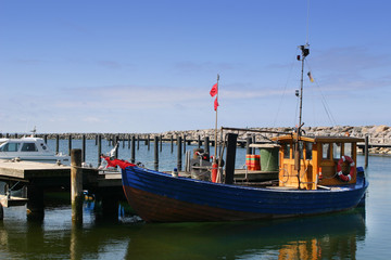 Small fishing boat in a habor