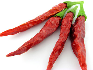 Spices. Pepper. A close up. It is isolated on a white.