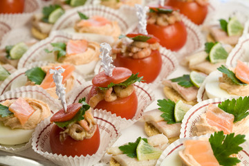 Delicious party snacks served on a platter