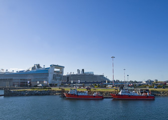 Pilot boats rest after guiding cruise ships to harbour