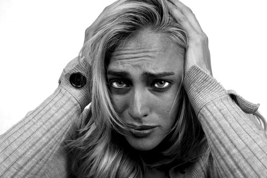 Monochrome Image of a Stressed Out Woman