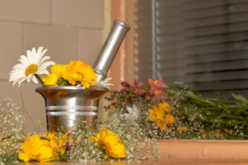 An image of mortar and flowers hghhg