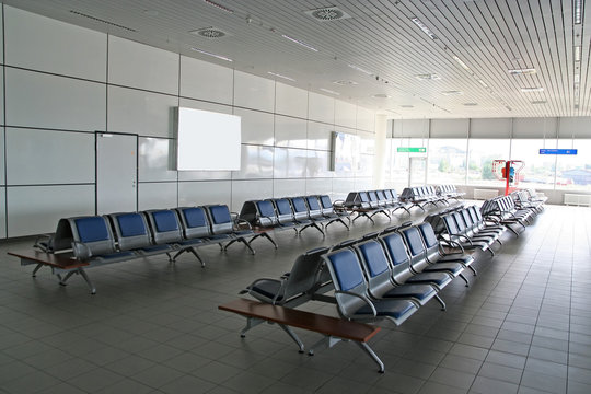 A waiting area in an airport terminal