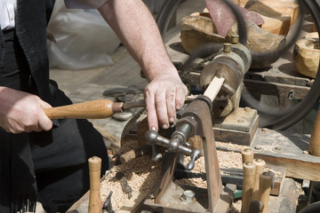 Woodturning. A craftsman turning wood on a lathe