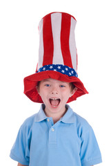 Young boy wearing a stars and stripes patriotic top hat 