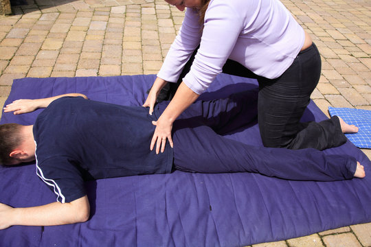 Lower back massage as part of a Thai body massage.