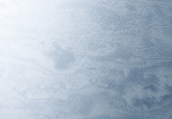 Blue scratched metal. Texture or background.