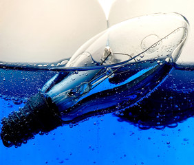 electric lamp in a blue liquid