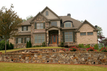 House over Stone Wall