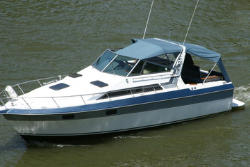 Fototapeta premium Sport boat going out to open waters