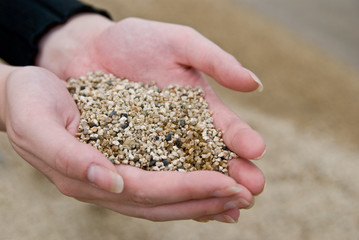 sand in female hands