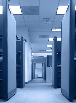 Long Row Of Empty Office Cubicles