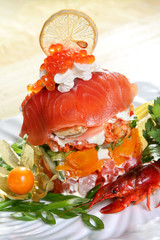 Seafood salad with red fish in restaurant