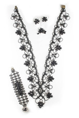 braided embellishment from beads with russian pattern.