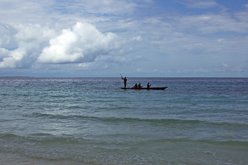 Fototapeta na wymiar Sailboat with four african fishmen. 