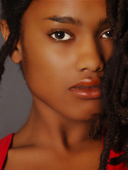 Lovely Closeup of beautiful Black woman on grey
