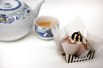 dessert and tea on white background