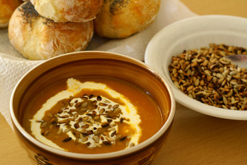 Butternut soup, sunflower seed and rolls